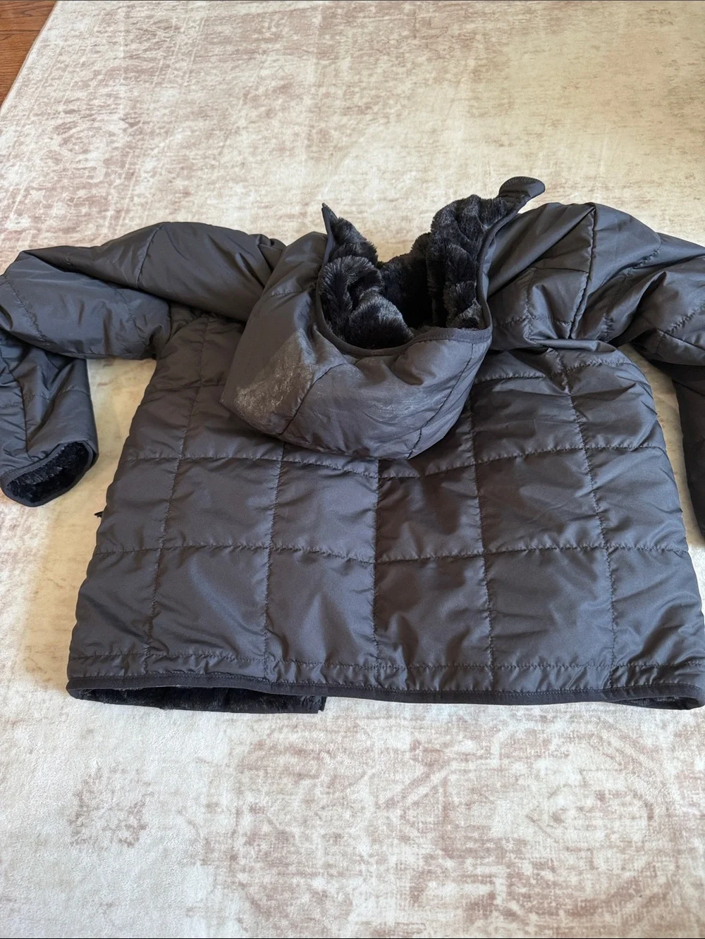 The North Face Children’s Hooded Faux-Fur Reversible Puffer Jacket in Black